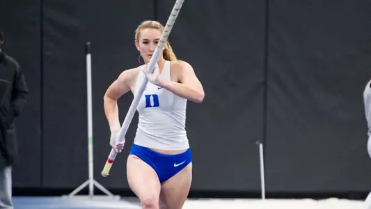 Paige Sommers prepares to pole vault at Blue White Scrimmage