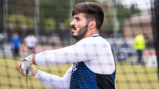 Aimar Palma Simo gets ready for the hammer throw