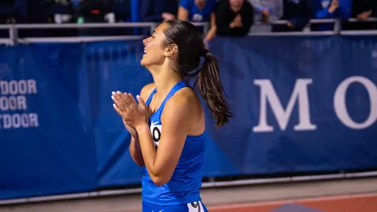 Charlotte Tomkinson takes a moment to exhale after finishing 1500m