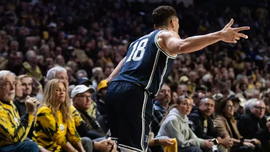 Mason Gillis celebrates a three-pointer at Wake Forest