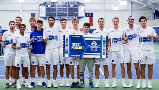 The Blue Devils line up with their ITA Team Championship ticket after defeating Vanderbilt 4-0 to capture the ITA Kickoff Weekend championship.