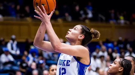 Delaney Thomas goes up for a shot