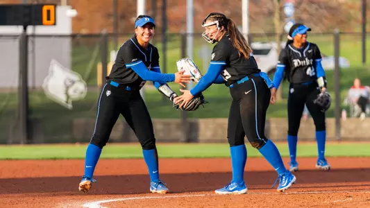 Thessa Malau'ulu and Cassidy Curd at Louisville game one 