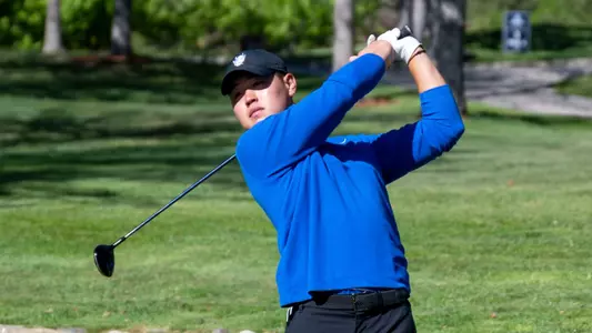 Bryan Kim tees off