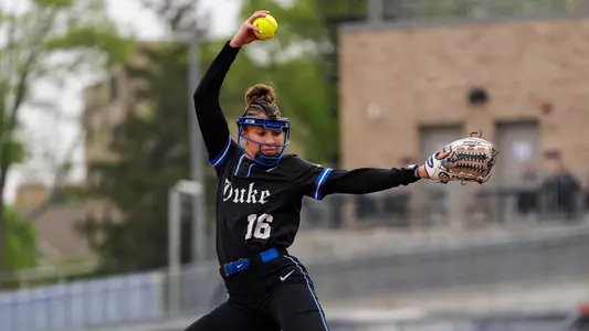 Dani Drogemuller throws a pitch during the ACC Softball Championship in a black uniform.