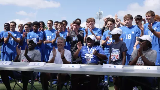 Bubacarr from Team IMPACT signs with Duke men's soccer