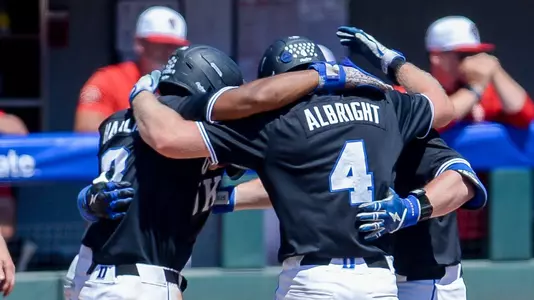 Tyler Albright celebrates with teammates