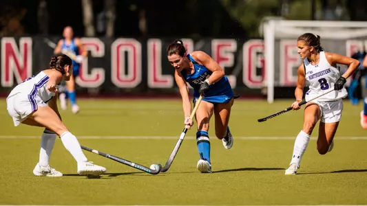 Duke's Alaina McVeigh dribbles the ball between a pair of Northwestern defenders