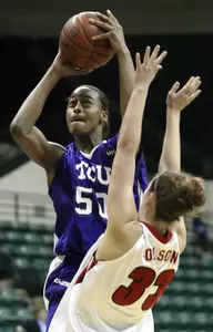 Sandora Irvin shoots over Louisville's Katie Olson. (AP Photo/Rick Havner)