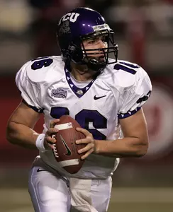 quarterback Jeff Ballard (16) rolls out to pass (AP photo)