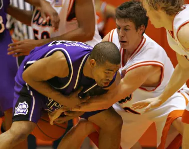 Texas-San Antonio's Kurt Attaway knocks the ball away from TCU's Neil P. Dougherty in the first half. (AP Photo)