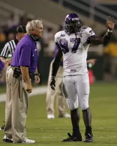 TCU defensive coordinator Dick Bumpas with preseason All-America defensive end Tommy Blake.