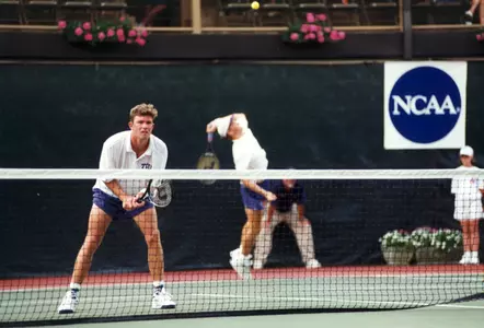 Ashley Fisher was a two-time All-American for the TCU men's tennis team who lettered four years from 1994 through 1997.