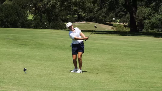 Claire Swathwood hits a wedge shot at Starr Hollow Golf Club