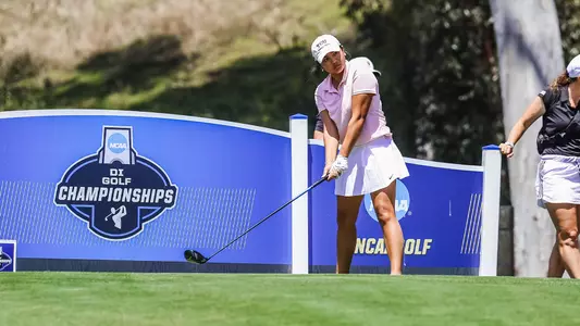 Kirstin Angosta lines up her tee shot at the NCAA D1 Women's Golf Championship.