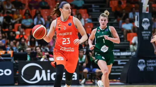 TCU women's basketball signee Claudia Contell dribbles during a game in Liga ACB.