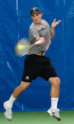 Mikolaj Caruk won both singles and doubles matches he played Saturday