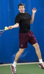 Peter Mimnagh-Fleming dominated at No. 5 singles in straight sets, 6-0, 6-1.