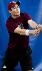 Semion Branzburg won in straight sets at No. 4 singles.