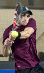 Mikolaj Caruk lost at No. 1 singles.