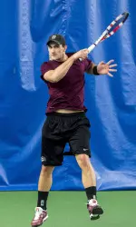 Mikolaj Caruk won at No. 1 singles.