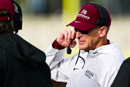 Head coach Bobby Hauck of the Montana Grizzlies looks on during the first quarter against the South Dakota State Jackrabbits at Dana J Dykhouse Stadium on December 7, 2024 in Brookings, South Dakota. 