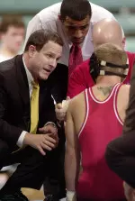 NC State wrestling coach Carter Jordan (l.) signed a pair of state champions in the fall signing period.