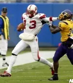 Chris Young gets by East Carolina's Erode Jean during the first half.