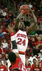 N.C. State's Julius Hodge shoots over Louisianna-Lafayette's Dwayne Mitchell