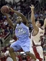 Rashad McCants drives on Ilian Evtimov.