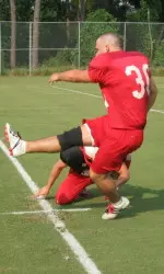 Tyler Lewis kicks extra points during a recent practice.