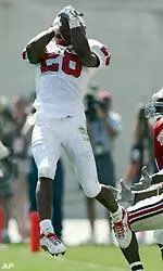 NC State cornerback Lamont Reid picks off pass in last year's game at Ohio State.