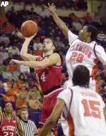 Engin Atsur shoots around Clemson's Shawan Robinson in the first half.