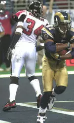 Pro Bowl receiver Torry Holt leads the Rams into the playoffs again.