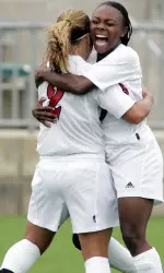 Senior Lydia McBath and junior Mandela Schumacher-Hodge celebrate one of McBath's two goals against Virginia Tech.