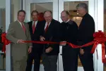 Wolfpack Club Executive Director Bobby Purcell, former All-American Andy Andrews, J.W. Isenhour, Chancellor James L. Oblinger and Director of Athletics Lee Fowler participate in the ceremonial ribbon-cutting.