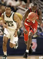 Julius Hodge steals the ball from Charlotte's Eddie Basden during the second half.