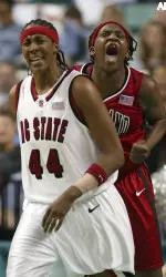 Crystal Langhorne, back, reacts after she is fouled by North Carolina State's Tiffany Stansbury.