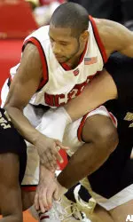 Tony Bethel battles for a loose ball with Wake Forest's Chris Paulduring the first half. (AP Photo/ Karl DeBlaker)
