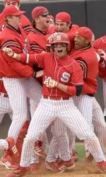 The Wolfpack mobs Aaron Cone after his game-winning walk-off single defeated Clemson on Sunday at Doak Field.