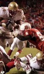 Stephen Tulloch makes a tackle.