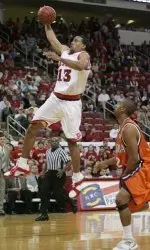 Cameron Bennerman goes in for a layup against Virginia