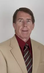 Head coach Brooks Teal