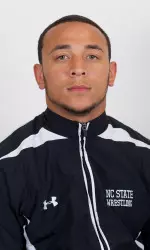 Colton Palmer pinned Nicholas Emison and helped lead NC State to a 23-15 victory over VMI on Friday.