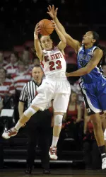 North Carolina State's Marissa Kastanek (23) pulls a loose ball away from Duke's Krystal Thomas (34) during the second half.