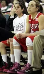 Paige Woodard, left, awaits her opportunity to play against Georgia Tech.