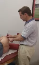 Dr. Krasnov shows the class a cervical technique.