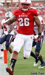 Tony Creecy runs it in for his first touchdown of the game.