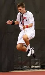 Sophomore Austin Powell celebrating after winning a point