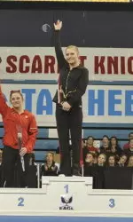 Senior Rachel Fincham claims the title on bars